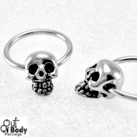 Captive Bead Ring with Grinning Skull Head Bead