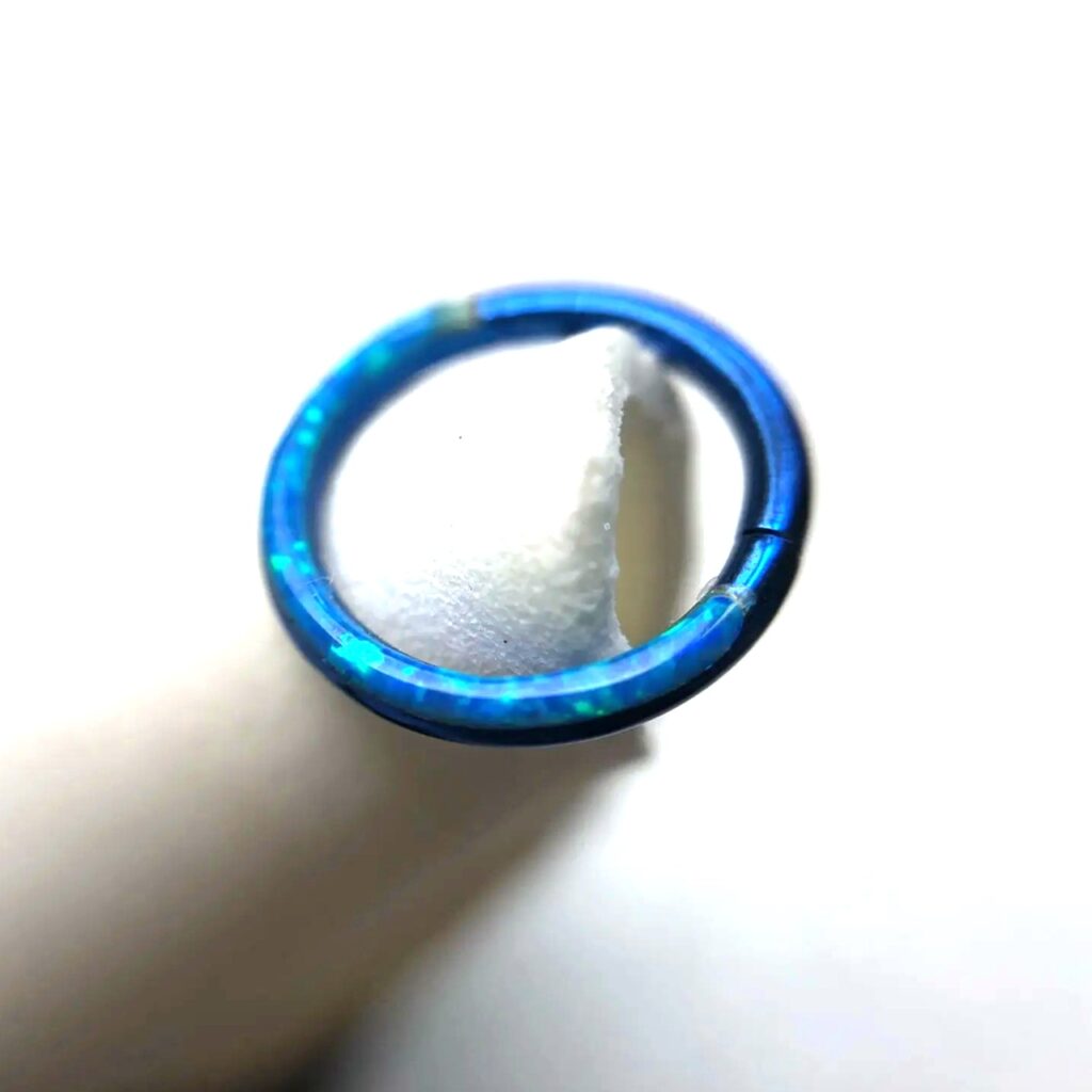 ASTM Titanium Hinged Ring with Front-Set Synthetic Opal Inlay